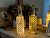 Декоративный светильник бутыль ПОСВЯЩЕНИЕ - карамельная, стекло, 10 тёплых белых микро LED-огней, 30 см, батарейки, Kaemingk