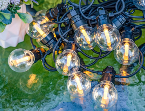 Светодиодная гирлянда Party Lights - ЛАМПОВОЕ НАСТРОЕНИЕ, прозрачная, 20 тёплых белых LED-огней, 10 м, контроллер, коннектор, чёрный провод, уличная, Winter Deco