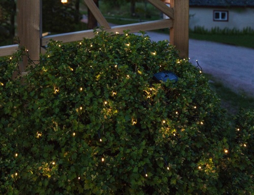 Садовая гирлянда "Капельки света", солнечная батарея, 100 тёплых белых LED-ламп, 10+3 м, чёрный провод, STAR trading фото 2