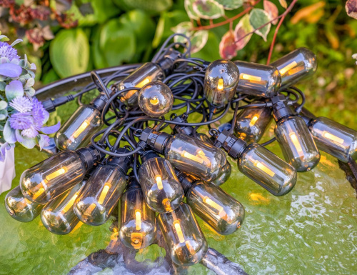 Светодиодная гирлянда из лампочек Party Lights - БАРАТОЛЛИ дымчатая, 20 тёплых белых LED-огней, 10 м, коннектор, чёрный провод, уличная, Winter Deco фото 4