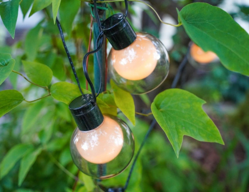 Светодиодная гирлянда БРЮМЕ, 10 тёплых белых LED-огней, длина 2.7+2 м, таймер, батарейки, черный PVC, уличная, Koopman International фото 5