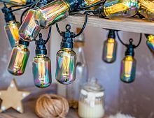 Светодиодная гирлянда из лампочек Party Lights - БАРАТОЛЛИ 'бензиновая', 20 тёплых белых LED-огней, 10 м, коннектор, чёрный провод, уличная, Winter Deco