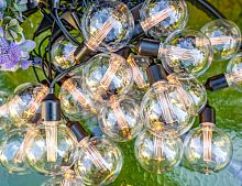 Светодиодная гирлянда-бахрома Party Lights - ЛАМПОВОЕ НАСТРОЕНИЕ, прозрачная, 20 экстра тёплых белых LED-огней, 10 м, коннектор, чёрный провод, уличная, Winter Deco
